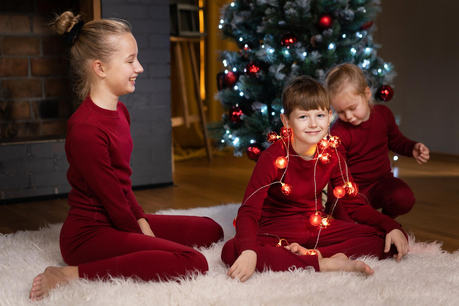 Kids-wearing-matching-Christmas-pajamas