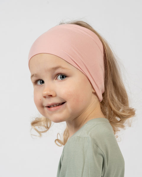 Kids bamboo neck gaiter in soft pink, gentle and stretchy scarf for everyday comfort.