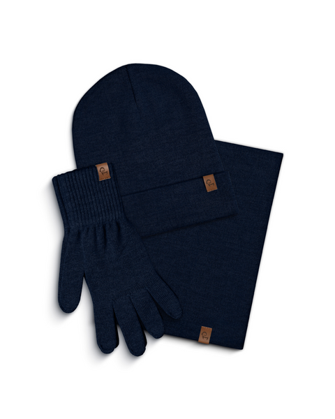 Navy blue knit hat, scarf, and gloves set on a white background
