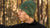 Man outdoors wearing dark green merino wool beanie