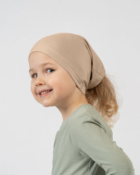 Kids beige beanie hat soft breathable fabric for children lightweight everyday wear