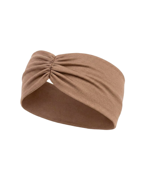 A wide beige fabric headband featuring a ruched, gathered knot detail at the center front, displayed against a plain white background.