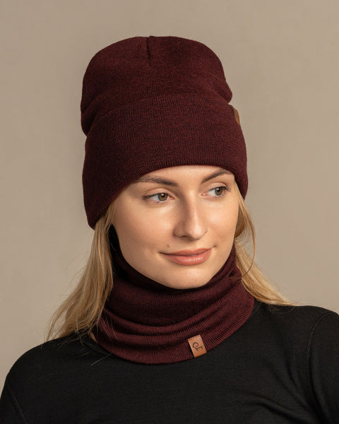 Women wearing knitted merino wool beanie and gaiter in royal cherry
