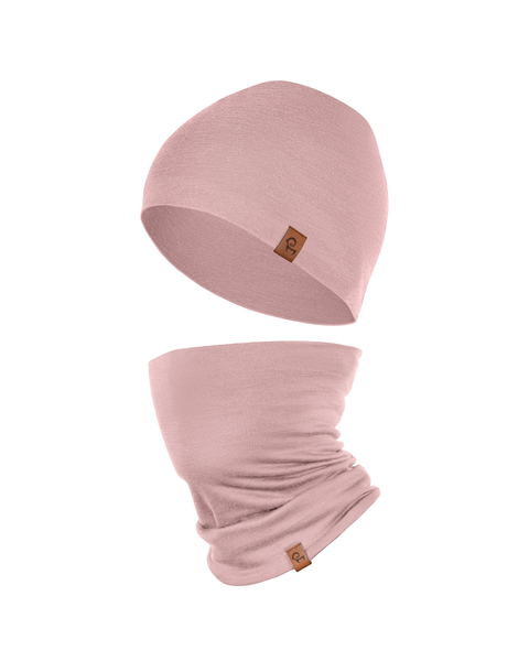 A product shot featuring a matching set of a dusty pink beanie hat and a tubular neck gaiter floating against a pure white background. The hat is positioned slightly above the gaiter. Both items have smooth fabric and feature a small, square brown leather logo patch.