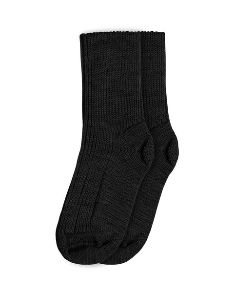 The menique kid&#39;s merino rib thick socks in dark gray color.