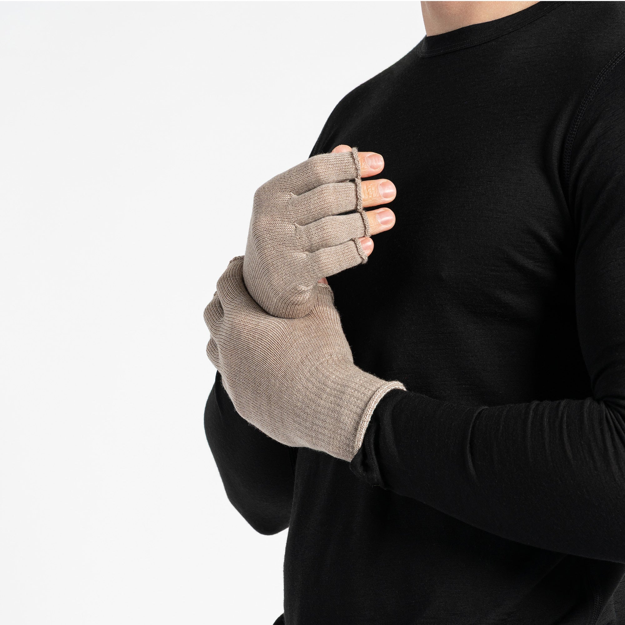 Creamy Beige menique knit beanie, neck gaiter, and fingerless gloves set on a white background