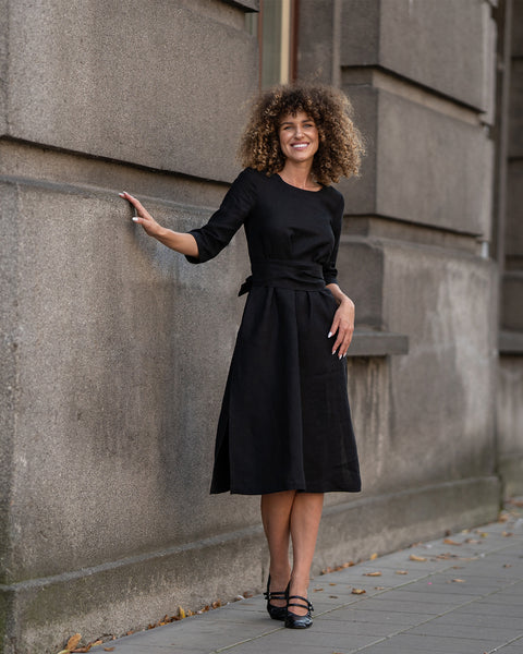 The menique linen 3/4 sleeve obi wrap dress MILEY in black color.