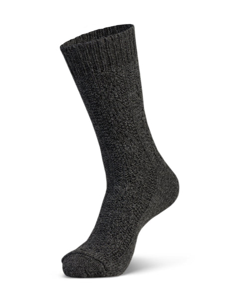 Dark gray merino wool sock on a white background