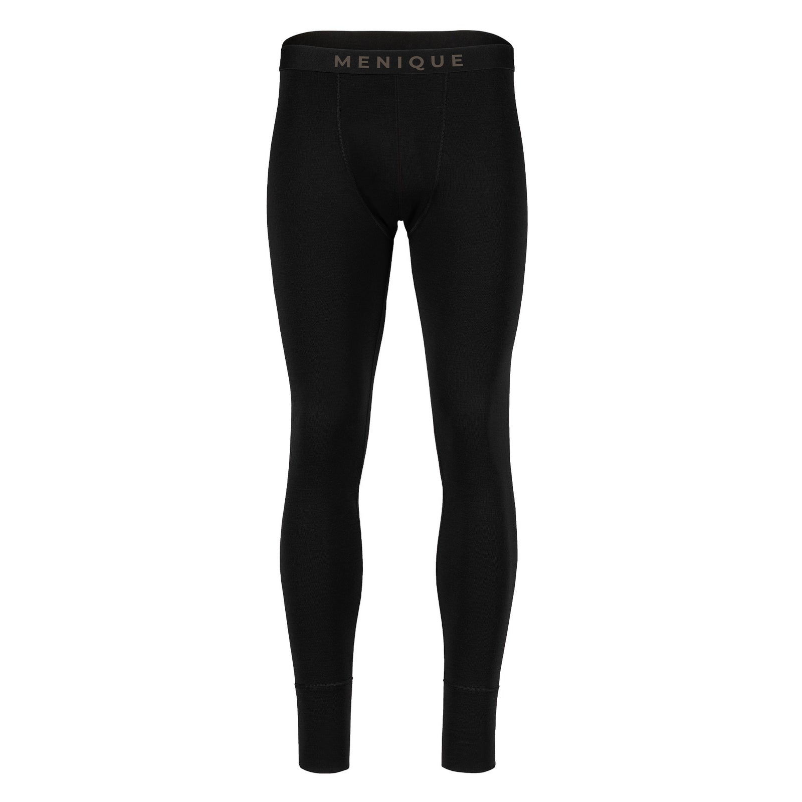 A model from the waist down wearing black men's compression leggings with a black waistband featuring the brand name 'MENIQUE' in gold lettering. The model is standing barefoot against a light gray studio background.