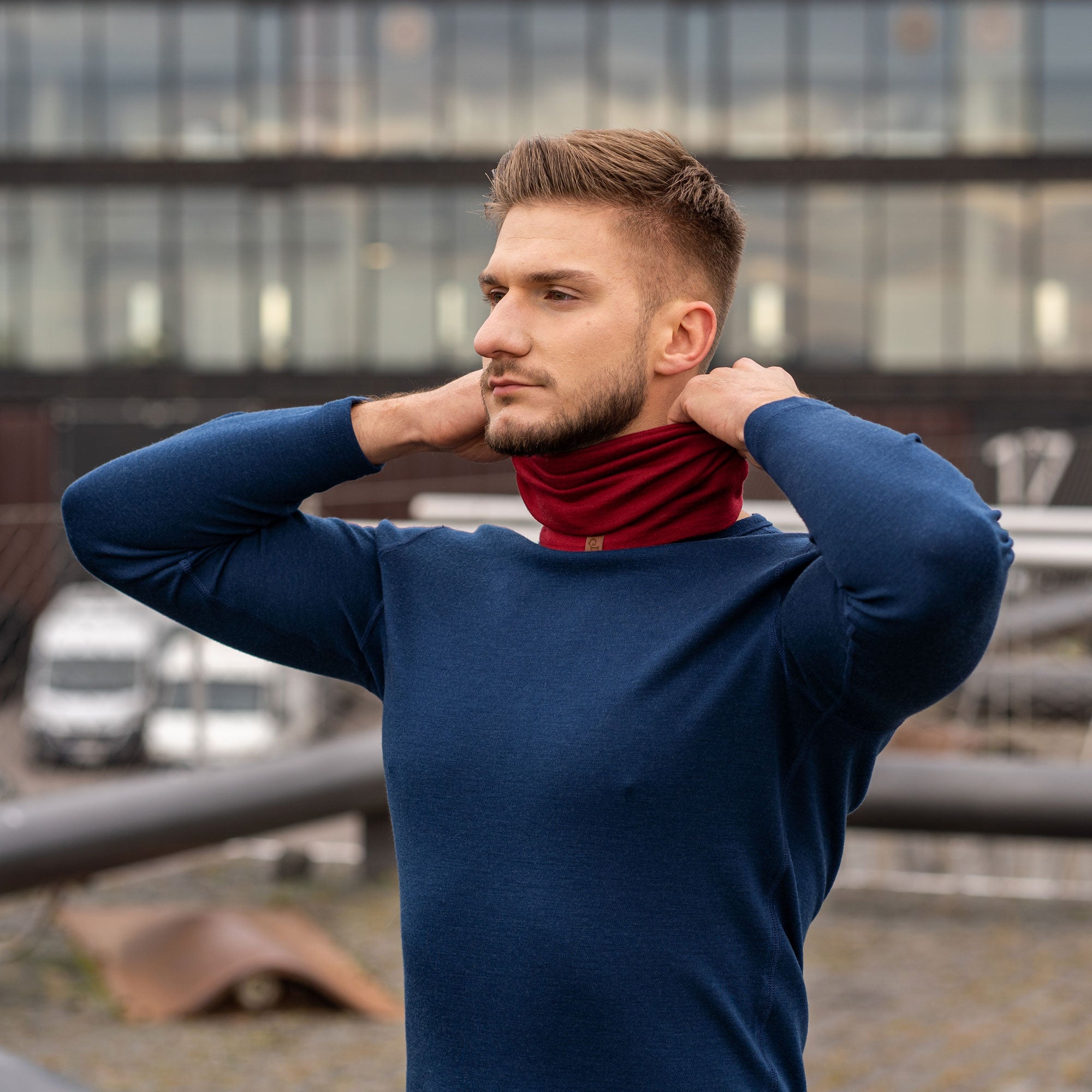 menique unisex neck gaiter in royal cherry color, in a white background.